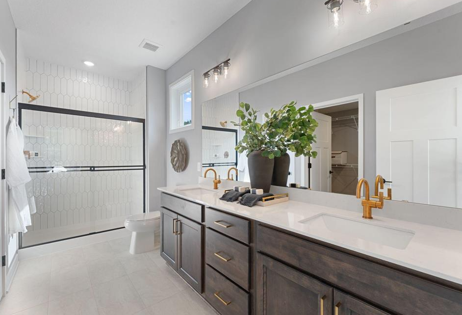 Photos of previously built home, options and finishes will vary.