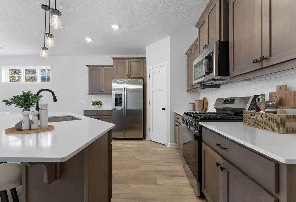 Photos of previously built home, options and finishes will vary.