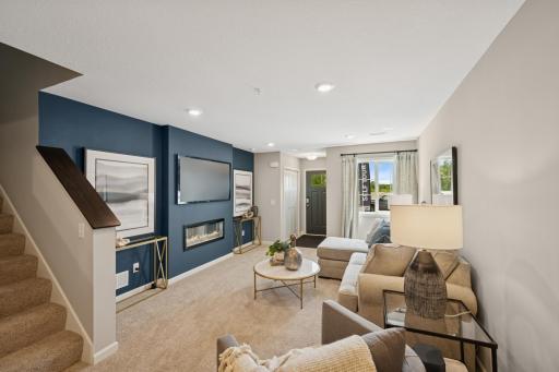 Living Room - photos of are a staged model home of the same floorplan. Colors and selections may differ.