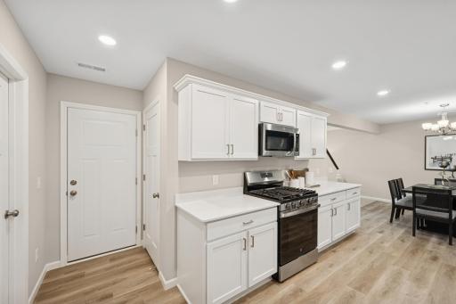 Kitchen - photos of are a staged model home of the same floorplan. Colors and selections may differ.