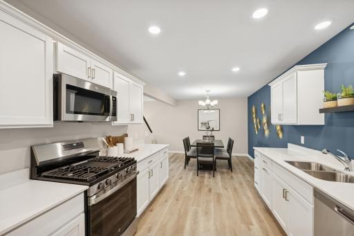 Kitchen - photos of are a staged model home of the same floorplan. Colors and selections may differ.