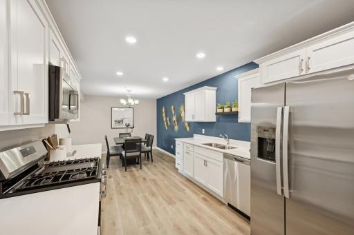 Kitchen - photos of are a staged model home of the same floorplan. Colors and selections may differ.