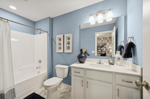Full Upstairs Bathroom - photos of are a staged model home of the same floorplan. Colors and selections may differ.