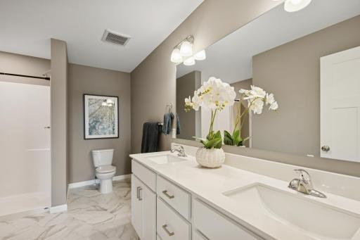 Primary Bathroom - photos of are a staged model home of the same floorplan. Colors and selections may differ.