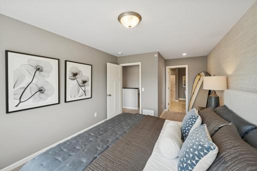 Primary Bedroom - photos of are a staged model home of the same floorplan. Colors and selections may differ.