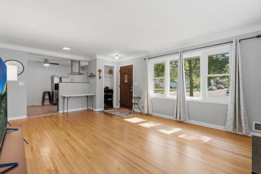 Living room views with beautiful natural lighting and views to kitchen.