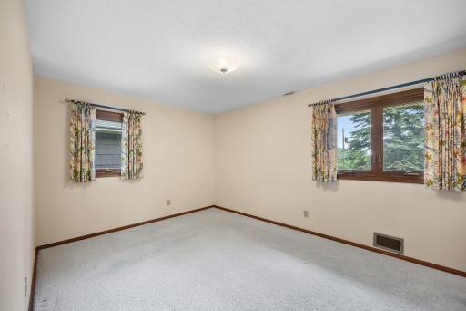 Primary bedroom with two windows