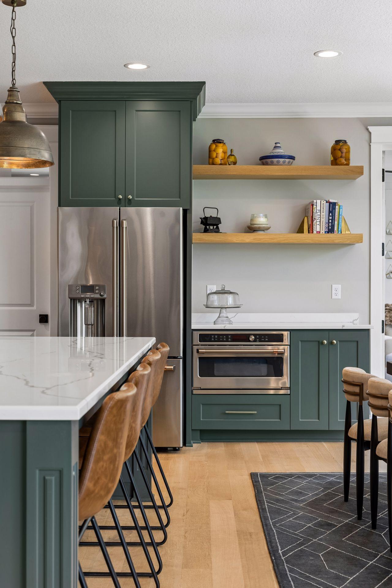Furniture-quality cabinetry, illuminated display cabinets, and a dramatic custom hood create a kitchen worthy of the finest culinary experiences.