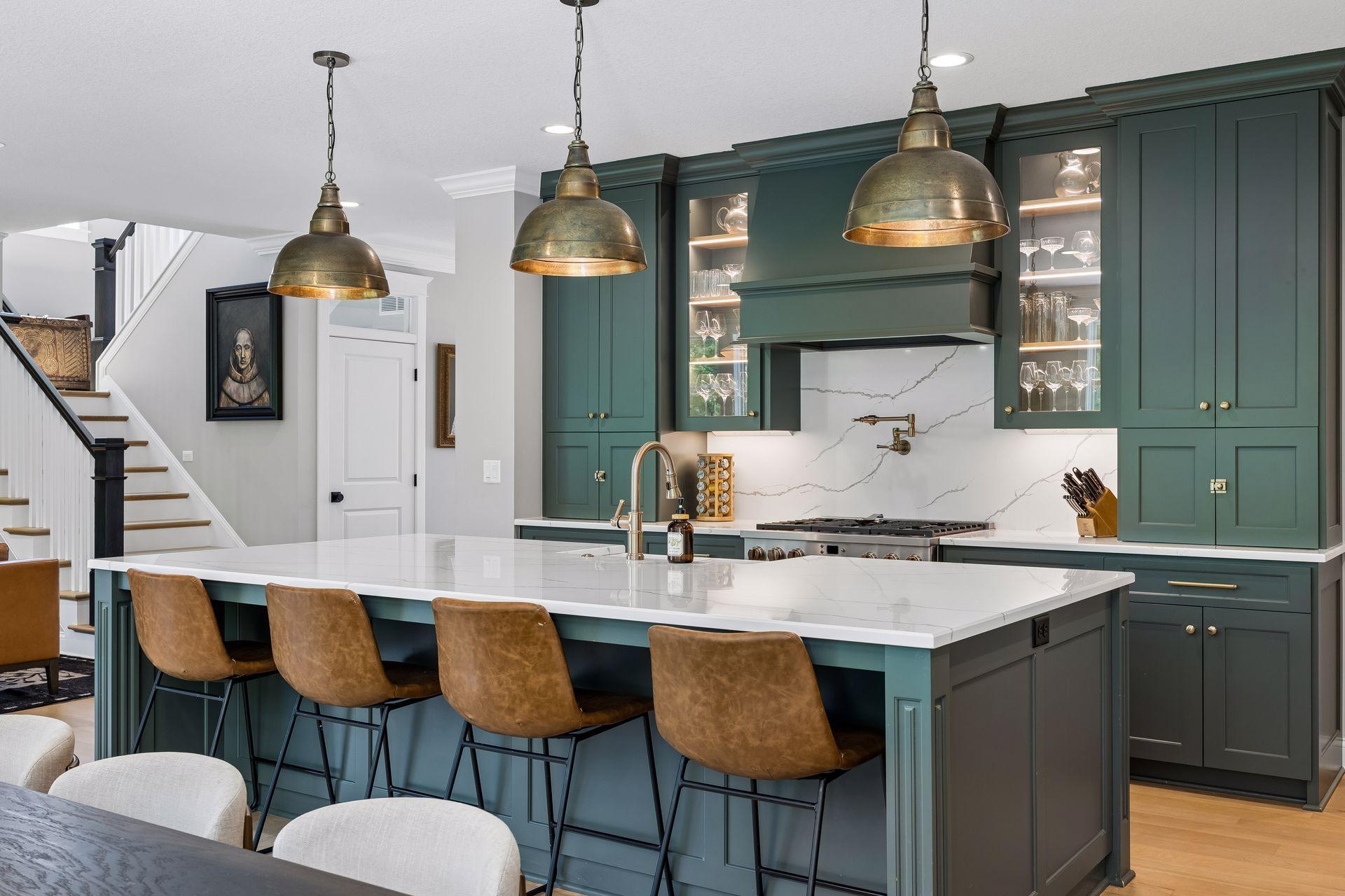 Every detail was carefully considered—from the oversized island to the handcrafted millwork and layered designer lighting.