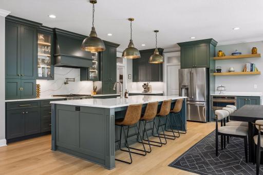 The heart of the homeâan architecturally designed kitchen where timeless craftsmanship meets effortless entertaining.