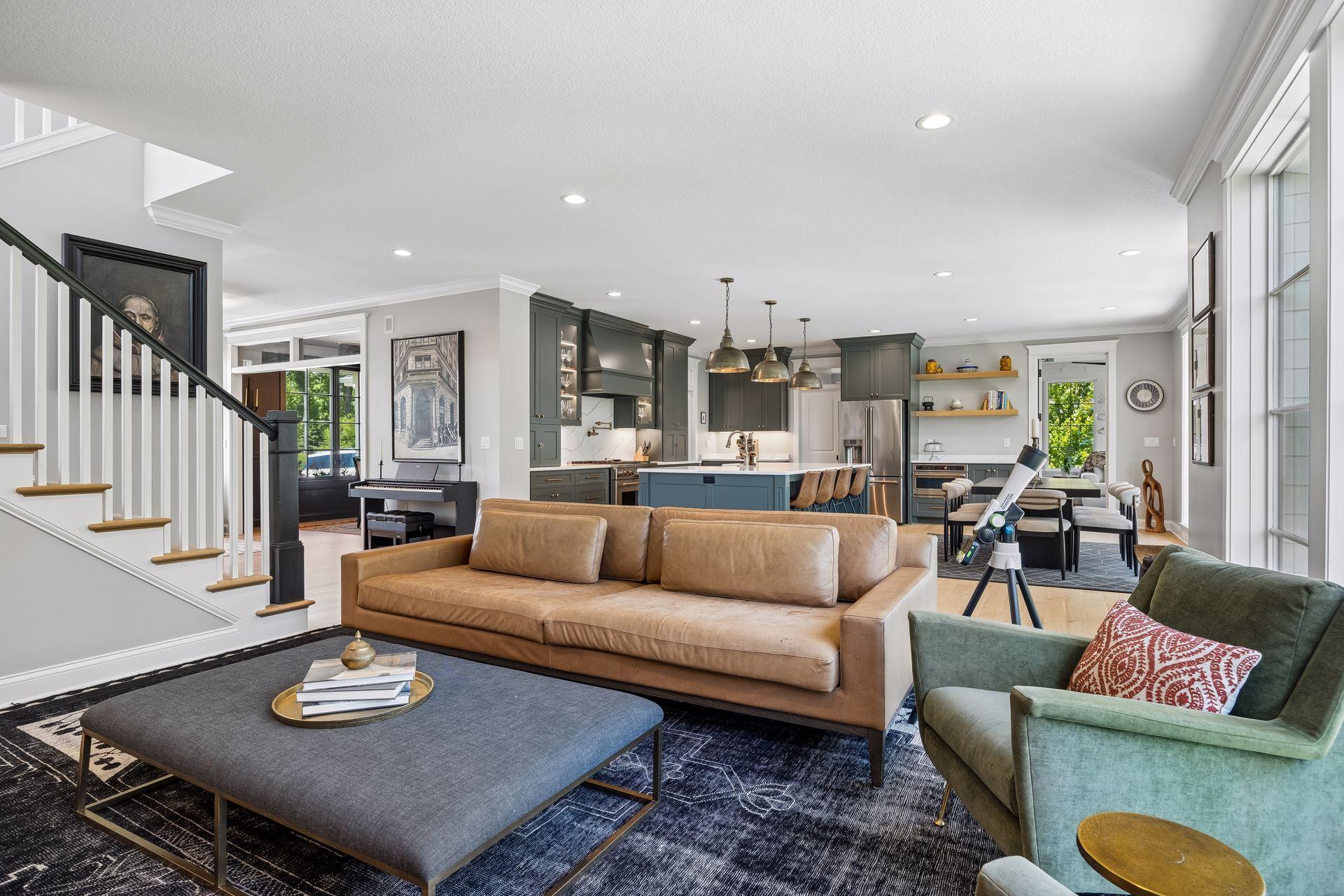 The main level combines timeless design, exceptional craftsmanship, and comfortable elegance with picturesque wooded views from nearly every angle.