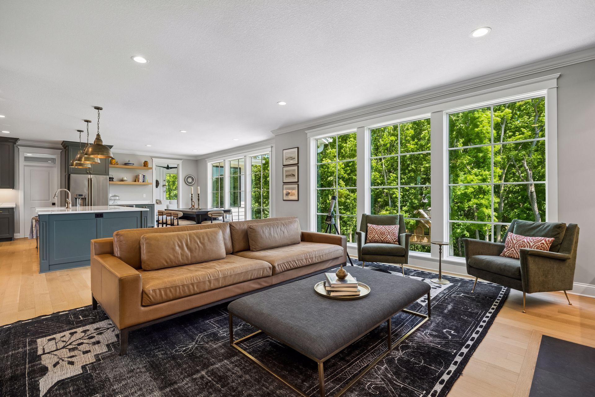 Open-concept living allows the great room, dining area, and chef's kitchen to flow together beautifully for everyday living and entertaining.