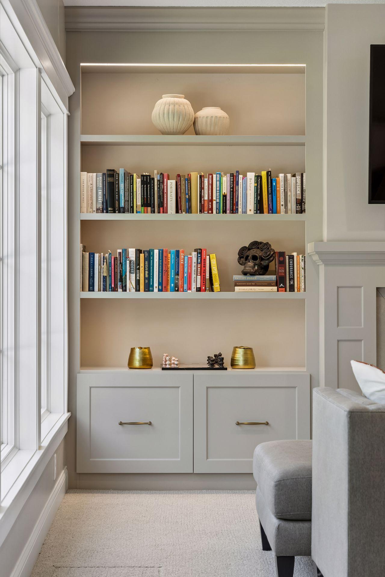Thoughtfully illuminated built-ins offer the perfect backdrop for treasured collections and curated displays.