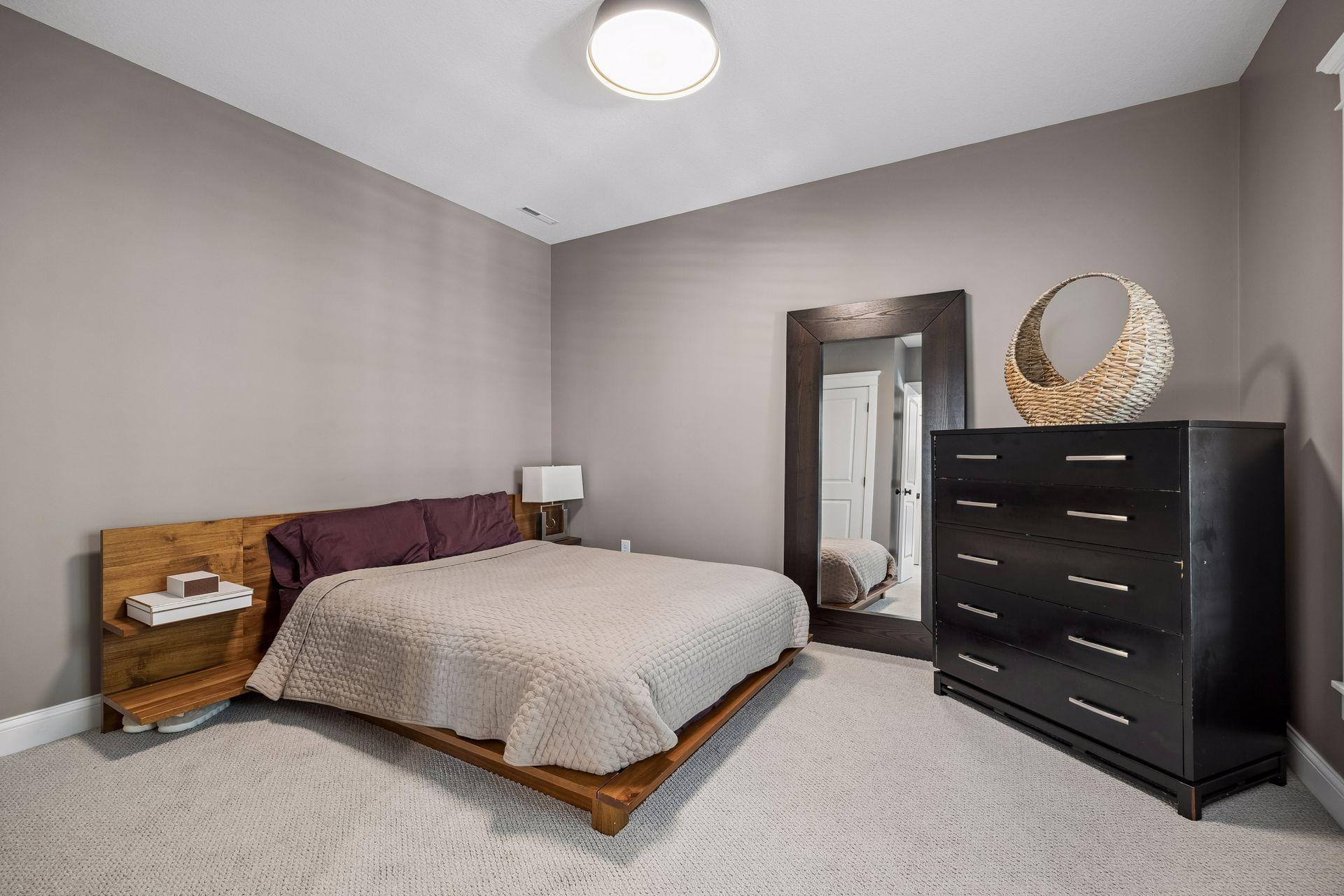 A spacious secondary bedroom offers comfort and privacy for overnight guests or family members.