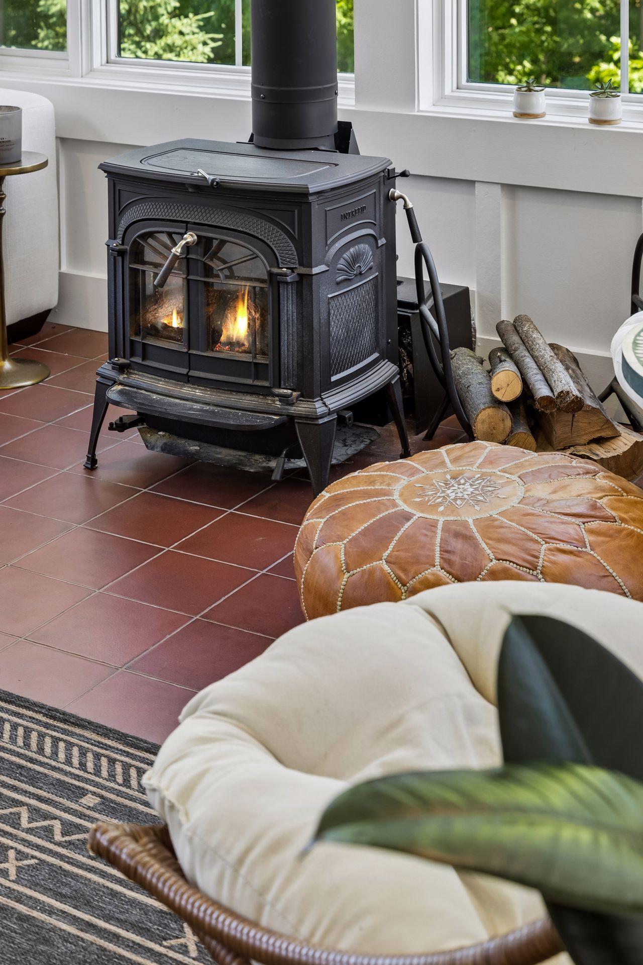 The wood-burning stove creates an inviting focal point, adding warmth and ambiance on crisp Minnesota evenings.