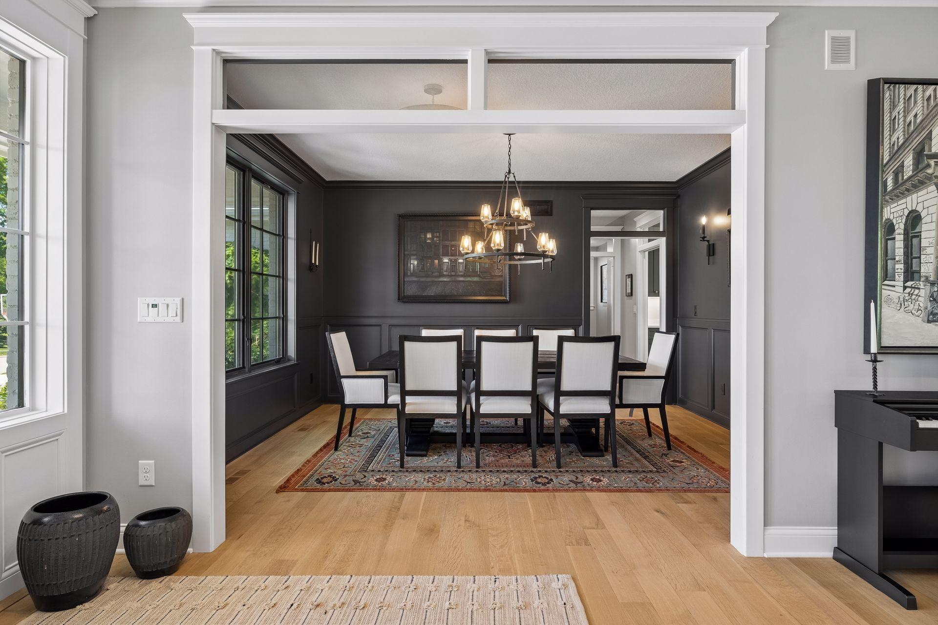 Elegant and intimate, the formal dining room embraces rich tones, custom millwork, and designer lighting for unforgettable evenings.