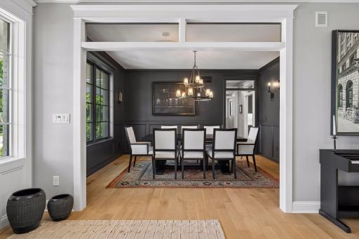 Elegant and intimate, the formal dining room embraces rich tones, custom millwork, and designer lighting for unforgettable evenings.