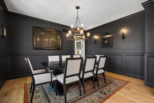 Gallery-inspired walls and curated finishes create an atmosphere that feels both sophisticated and inviting.