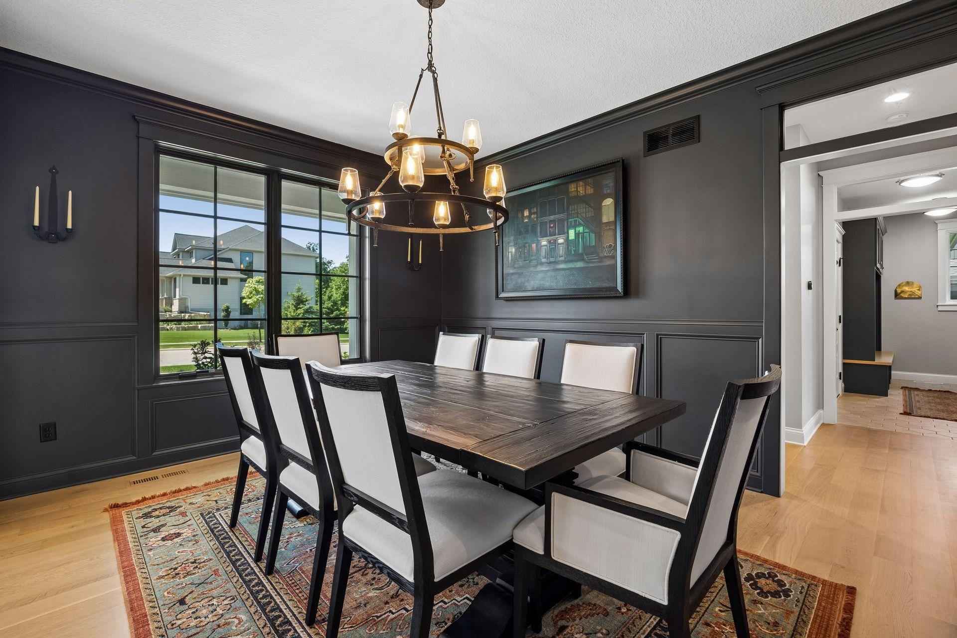 A dramatic entertaining space where classic architecture meets refined modern design.