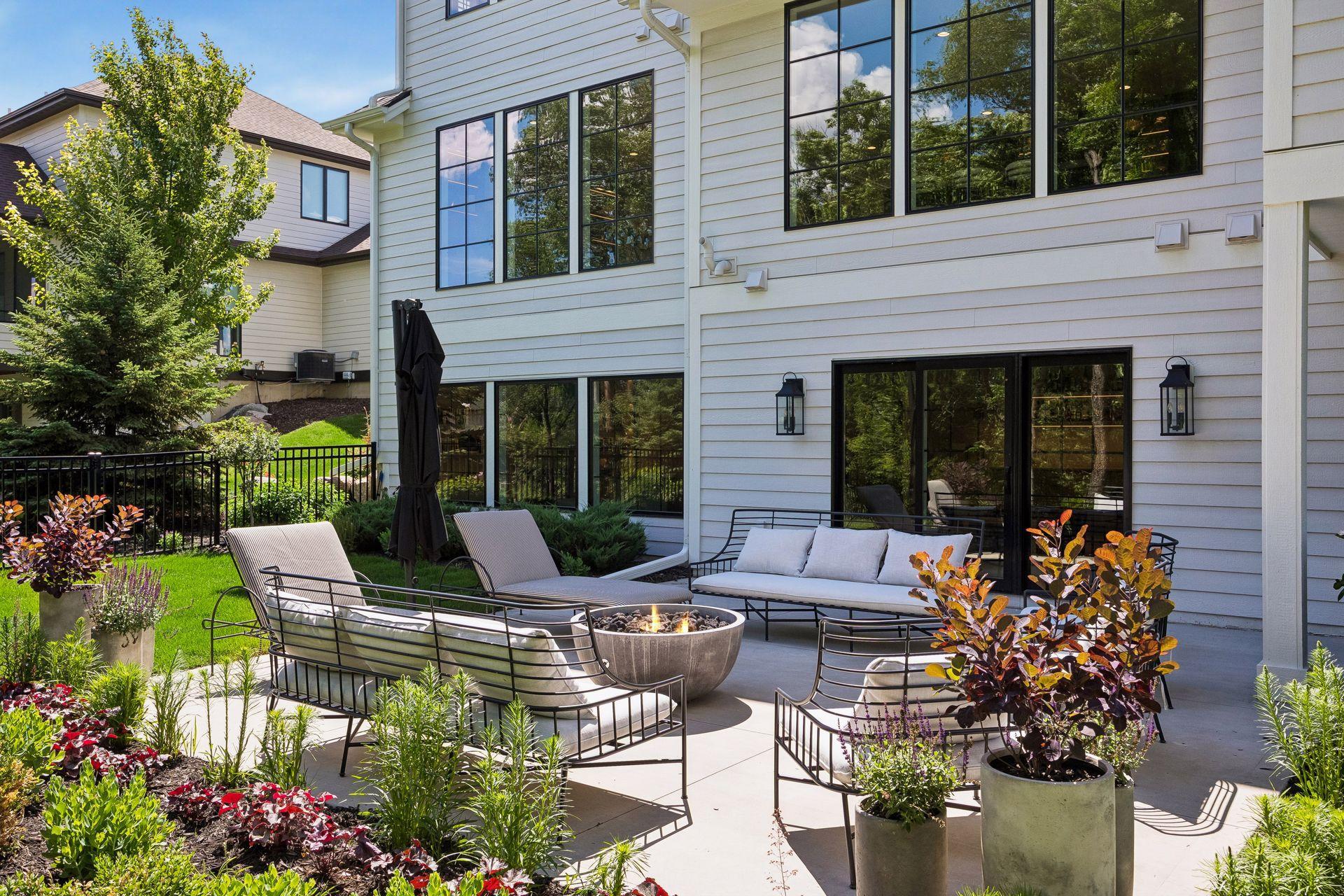 Enjoy tranquil wooded surroundings while remaining protected from the elements beneath the expansive covered terrace.