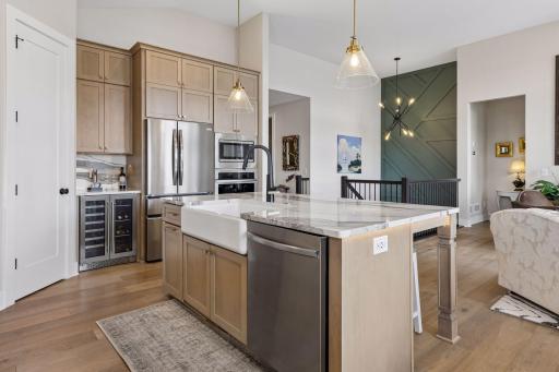 Large center island, and extra tall cabinets for added storage.