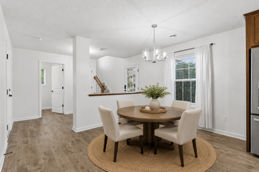 Open dining area with natural light and easy flow to kitchen and great room.