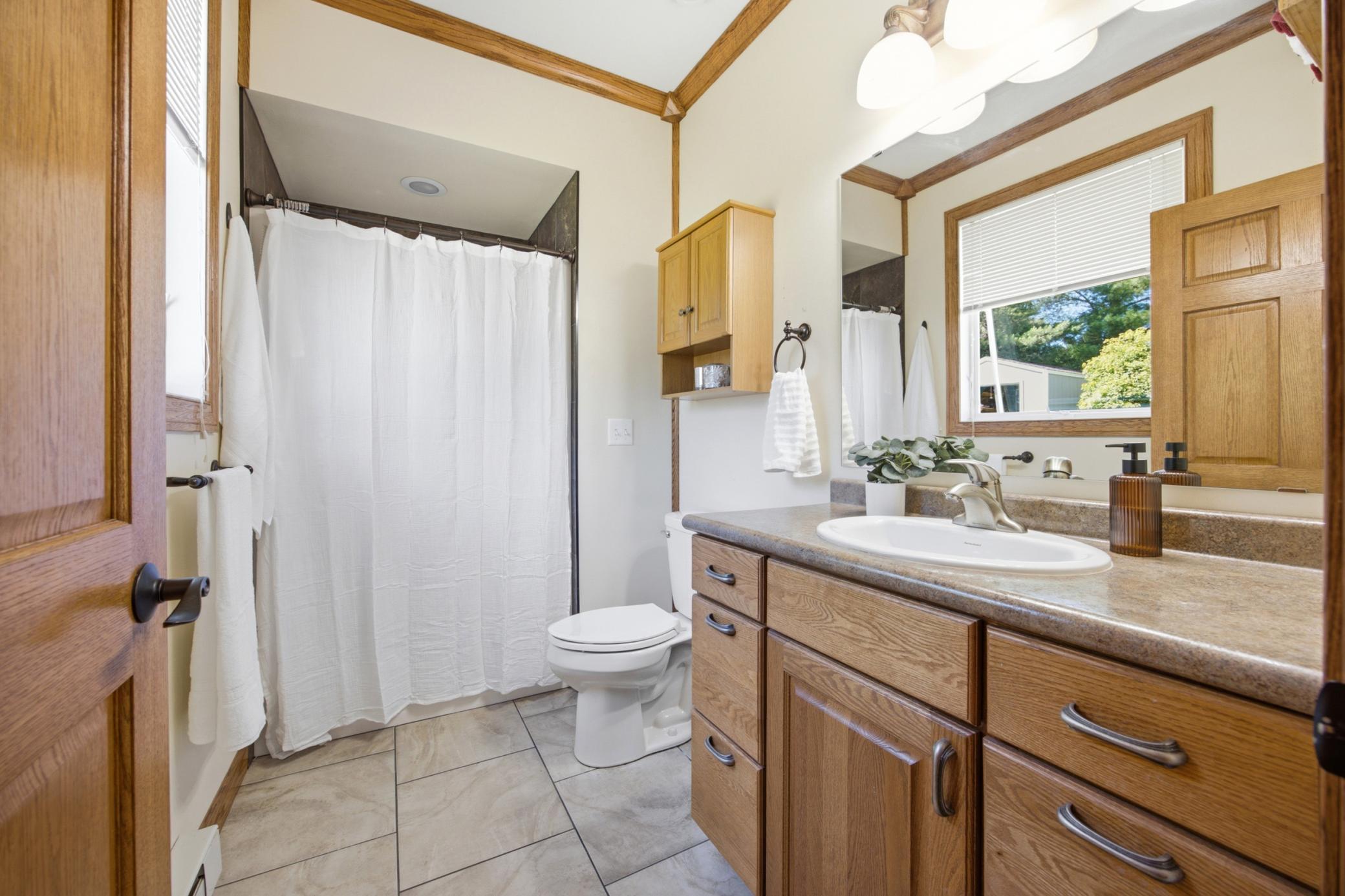 Primary 3/4 Bath w/ Window