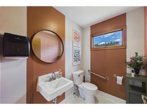 Bathroom 1-connect it to the bathroom next to it and add a shower/tub