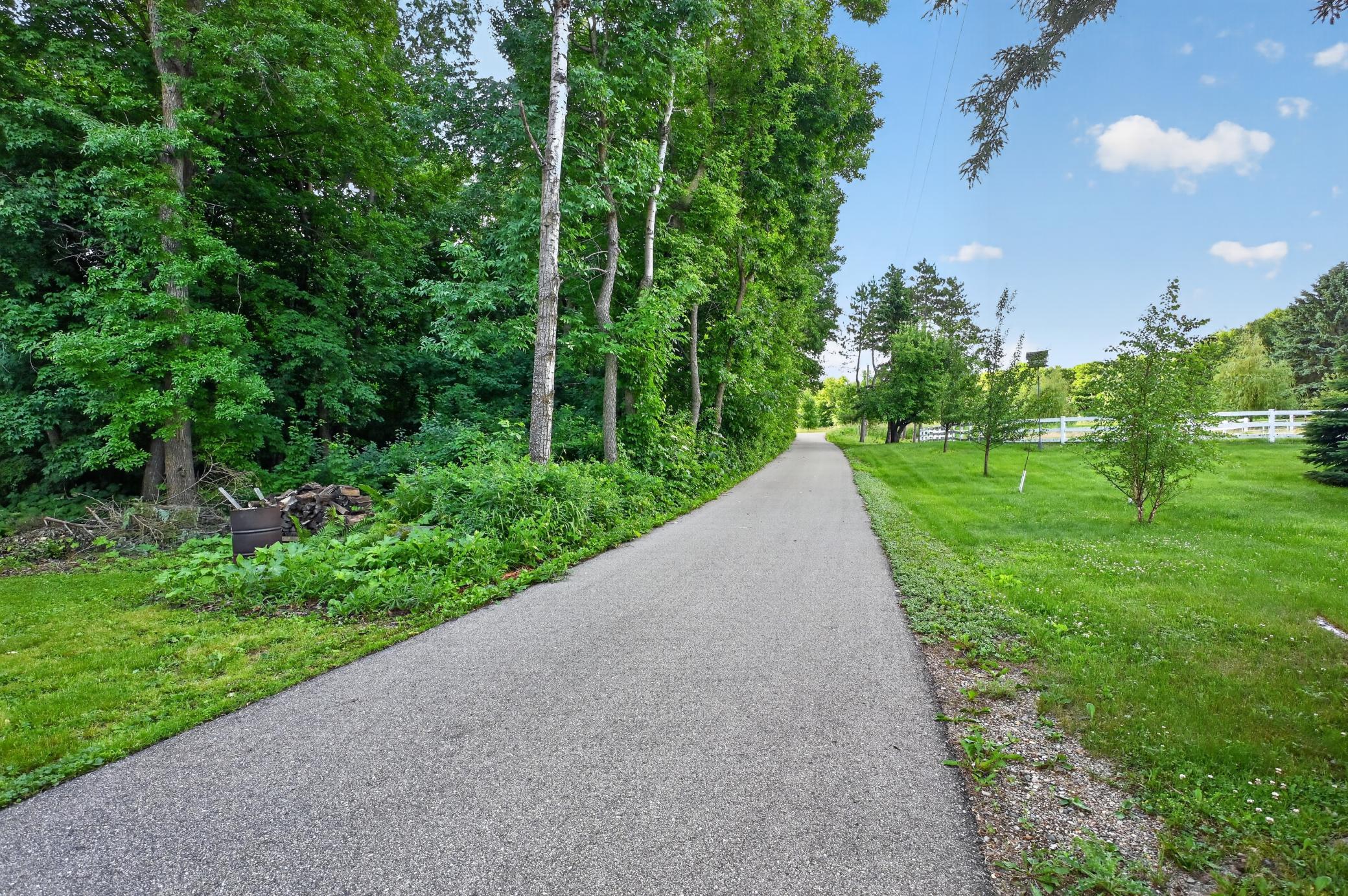 1.27 acres. Long drive in setting you back nicely from the road.
