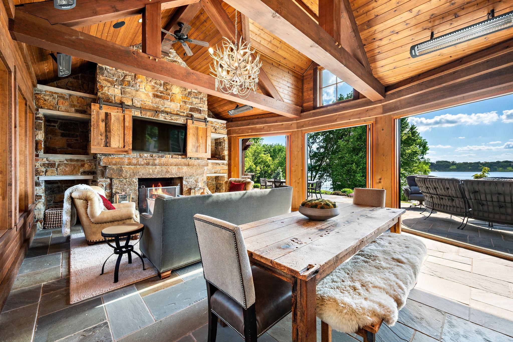 3 season porch with fireplace, roll up screens, and supplemental electric heaters