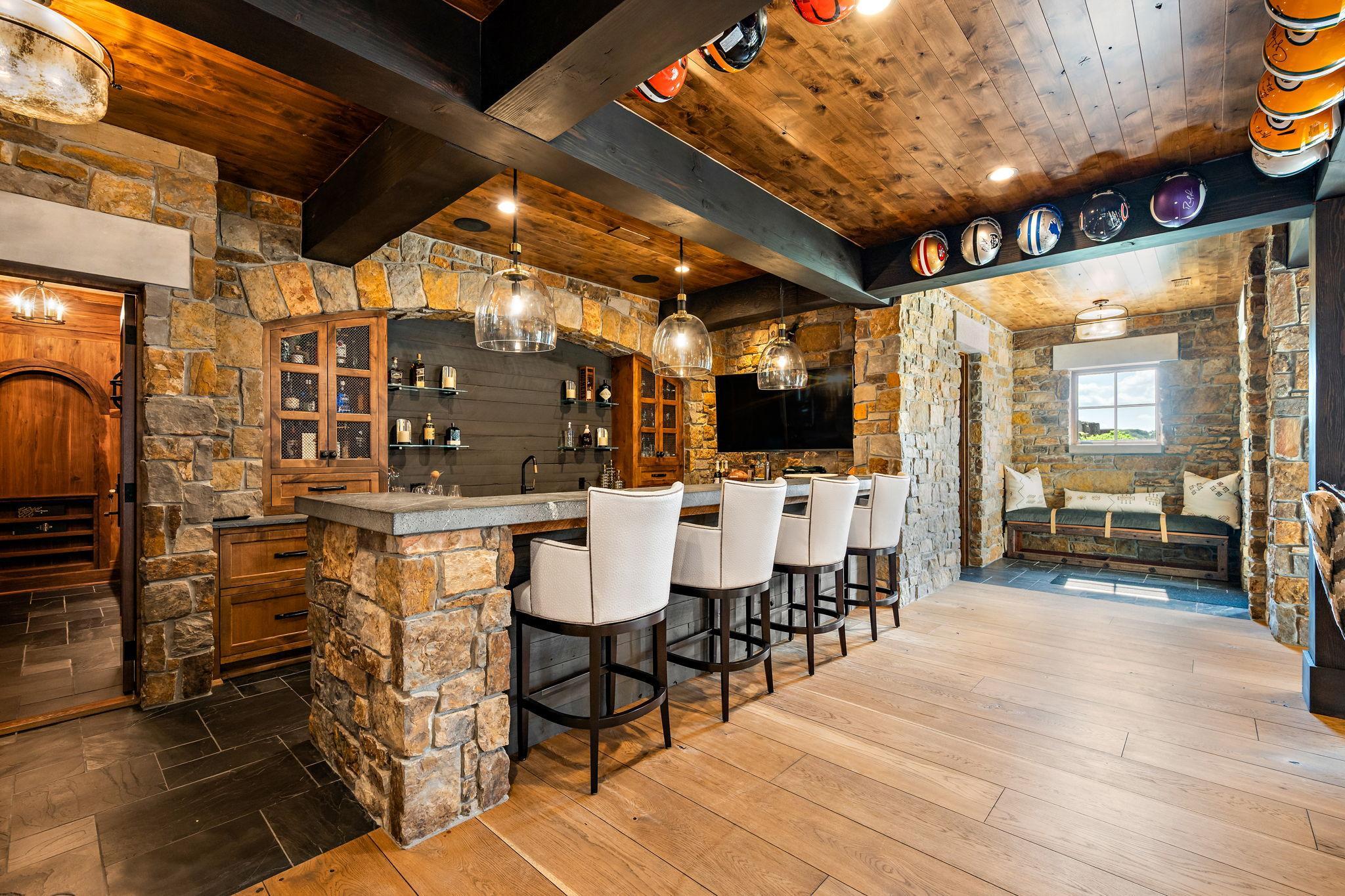 Lower level wet bar with wine cellar