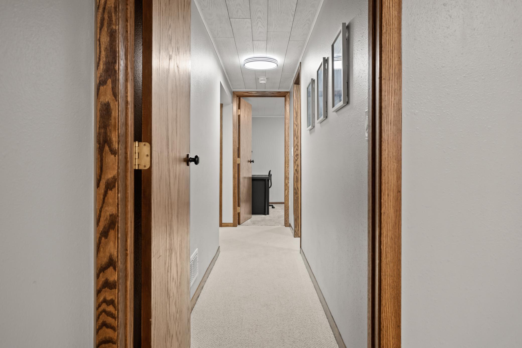 Hallway to more bedrooms