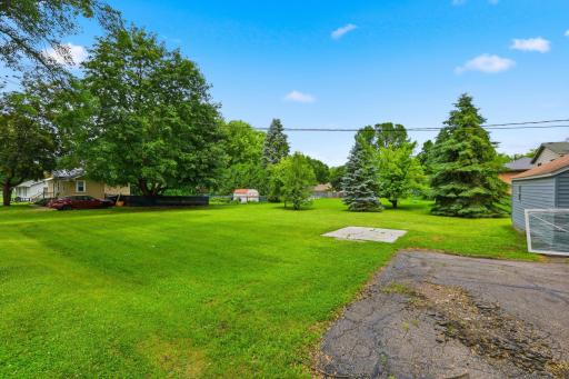 The over-sized corner lot is great for pets, gardens or future 2+ car garage.