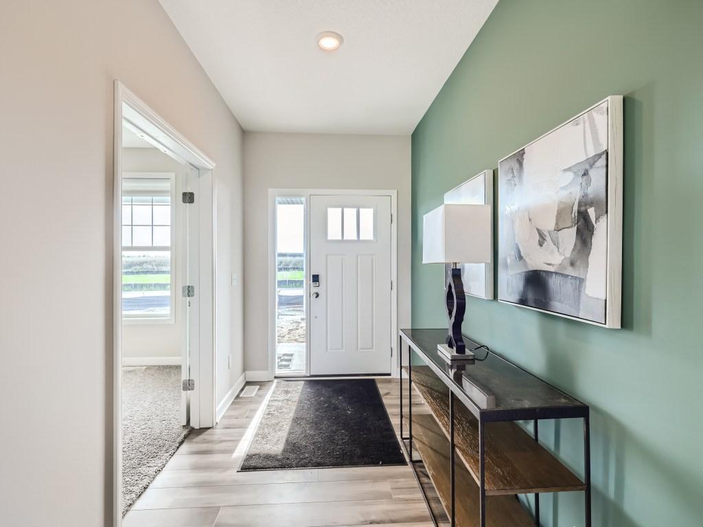 Photo is of the actual model. Make the best first impression with this bright and open foyer!
