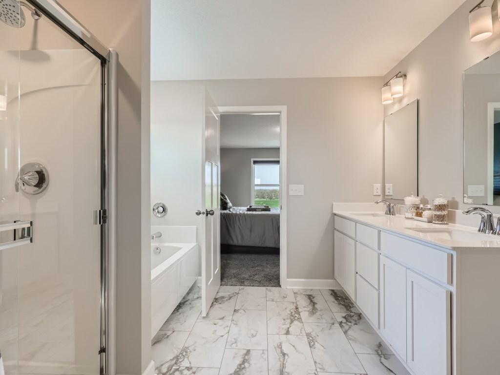 Photo is of the actual model. Separate soaking tub to relax after those long days.