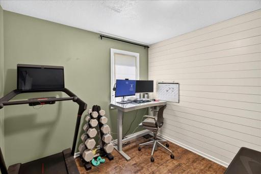 The fourth bedroom, currently used as a flex space, offers neutral finishes and is ready to welcome you home.