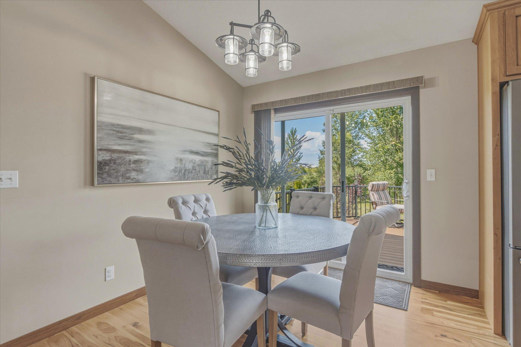 Dining Area off Kitchen also leads to Large, Updated, Maintenance Free Deck