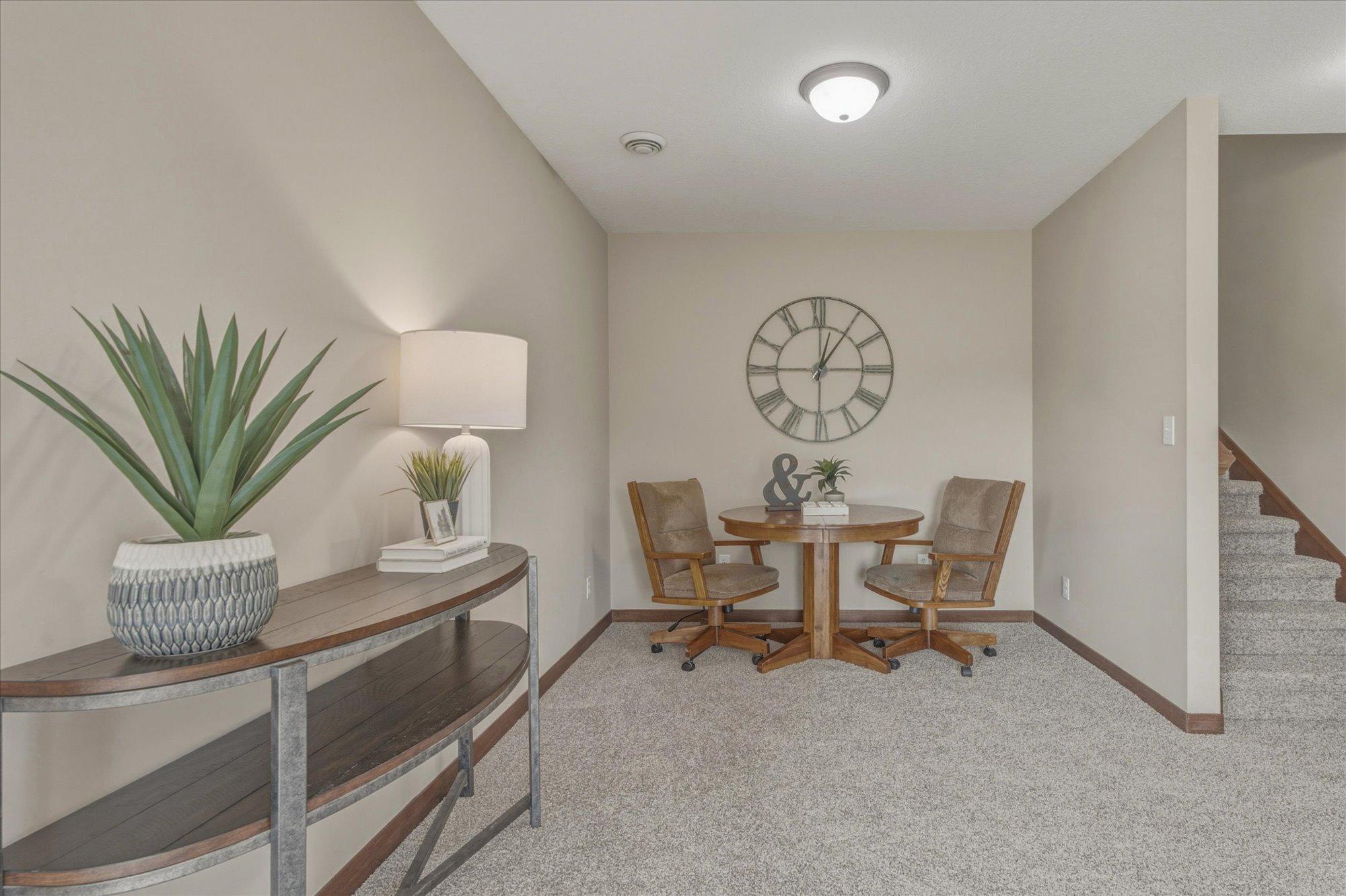 This nook could be used for a small kitchenette, dining area, game table, workout area - and so much more