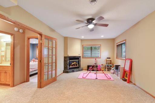 An additional family/rec room is found in the lower level with french doors and fireplace