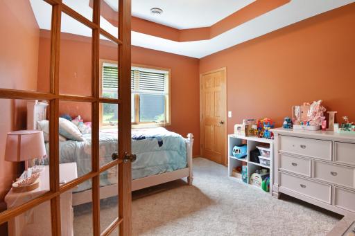 Walk-in closet, french doors and tons of natural light