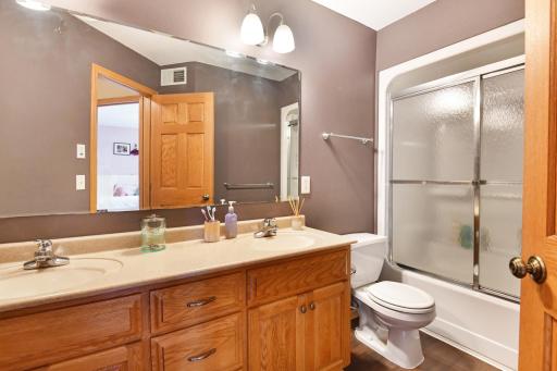 The full upper level bath also features dual sinks