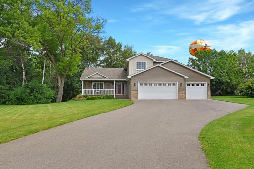 A meticulously landscaped 2/3 Acre, Park-Like setting awaits!