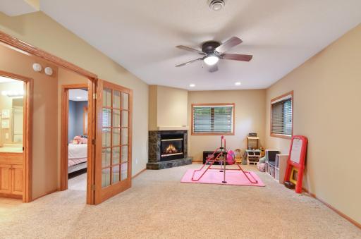 An additional family/rec room is found in the lower level with french doors and fireplace