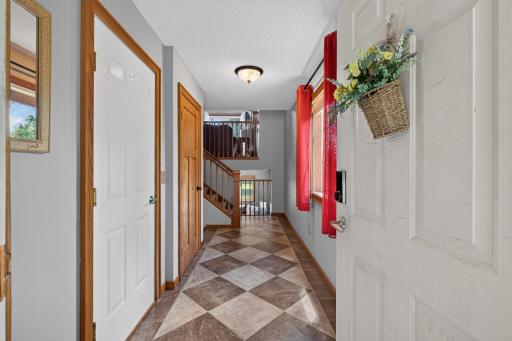 View to front entry with garage entry on the left