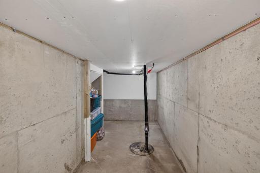 Large, lowest level storage and sump pump