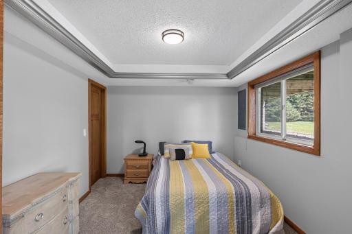 Lower level bedroom with LED ceiling lights