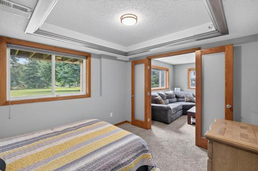 Lower level bedroom with view to family room