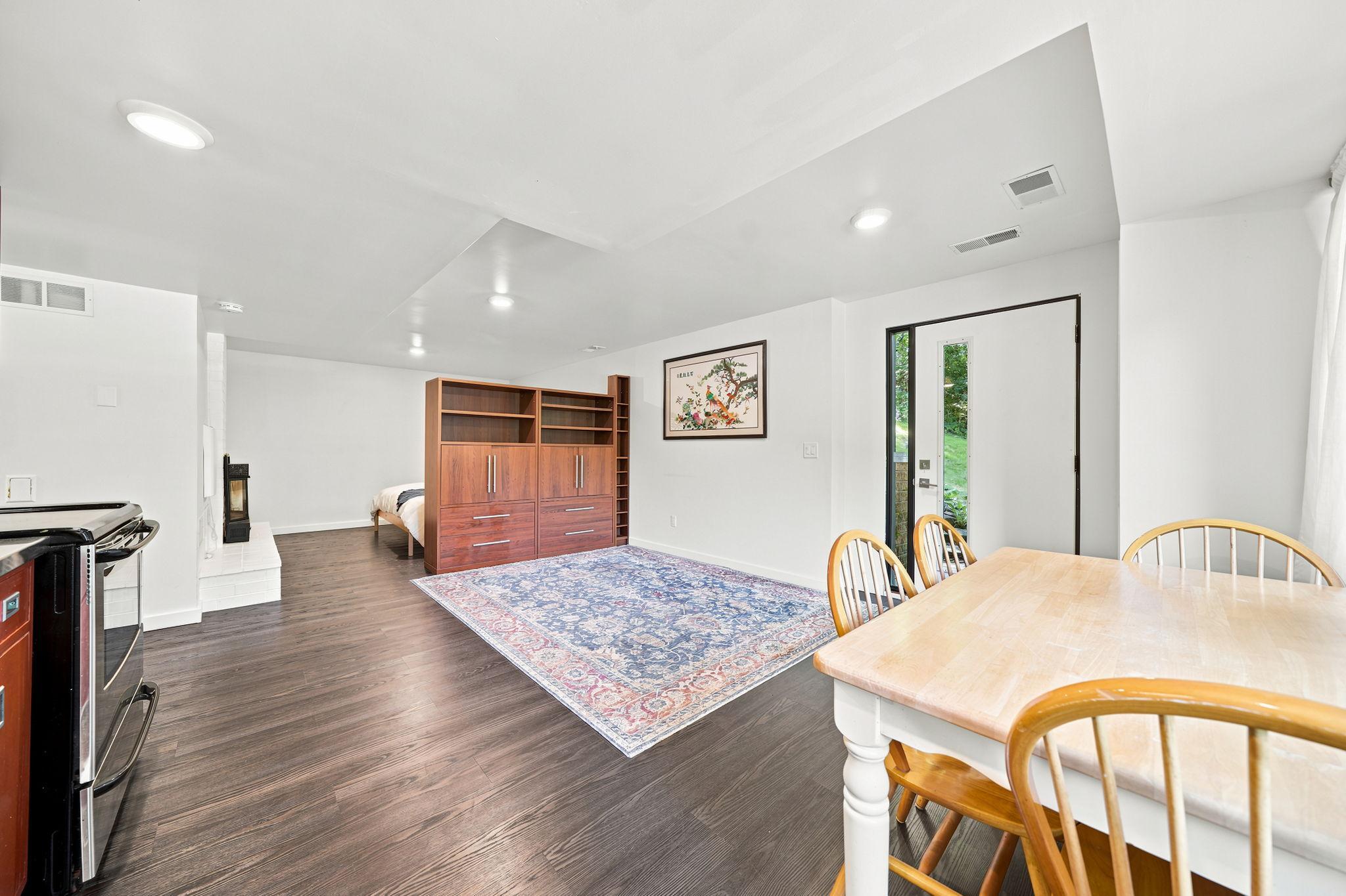 Lower Level Room with separate entrance and kitchenette, great for use as a home office, studio apartment, or family room