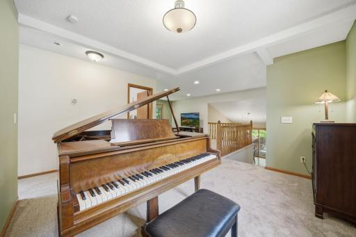 This nook in the upper level provides a great space for a piano!
