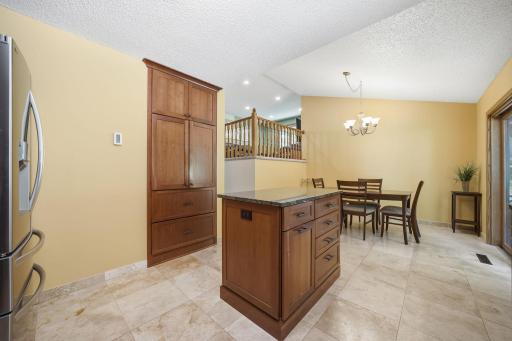 The center island adds even more workspace and storage, making meal prep, entertaining, or everyday life a little easier.